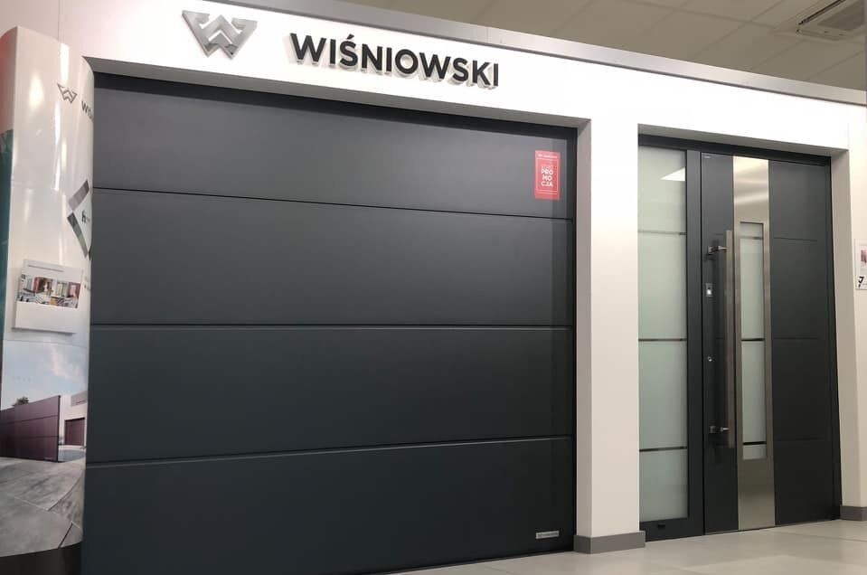 Секційні гаражні автоматичні ворота Wisniowski - вхідні двери алюмінієві для будинку - Київ