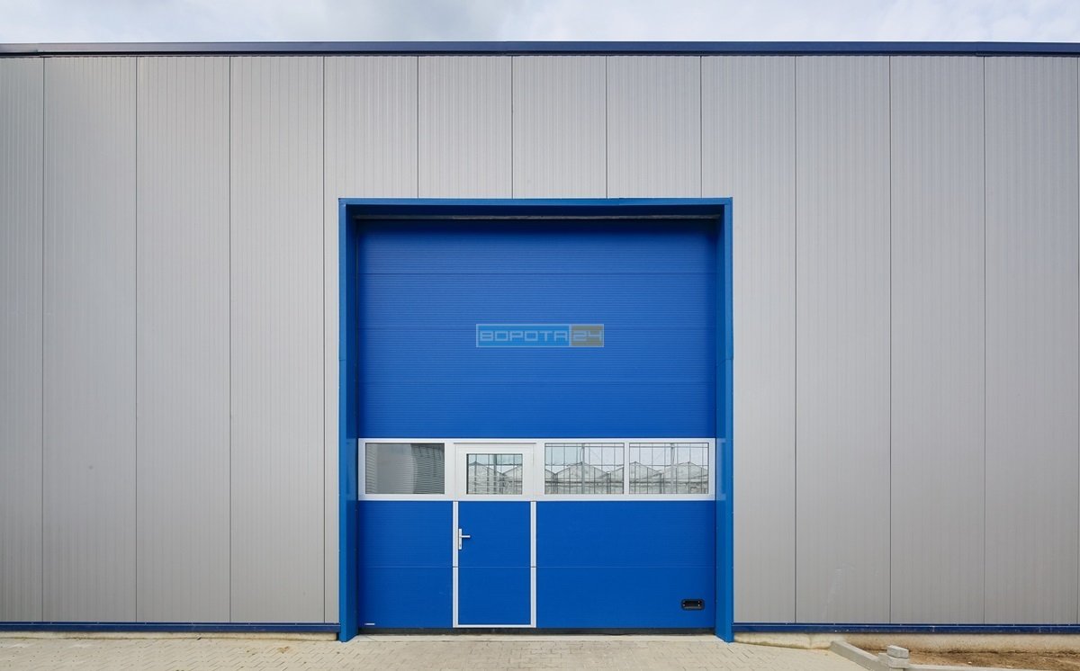 теплі енергоефективні ворота на склад, ангарні конструкції підйомного типу